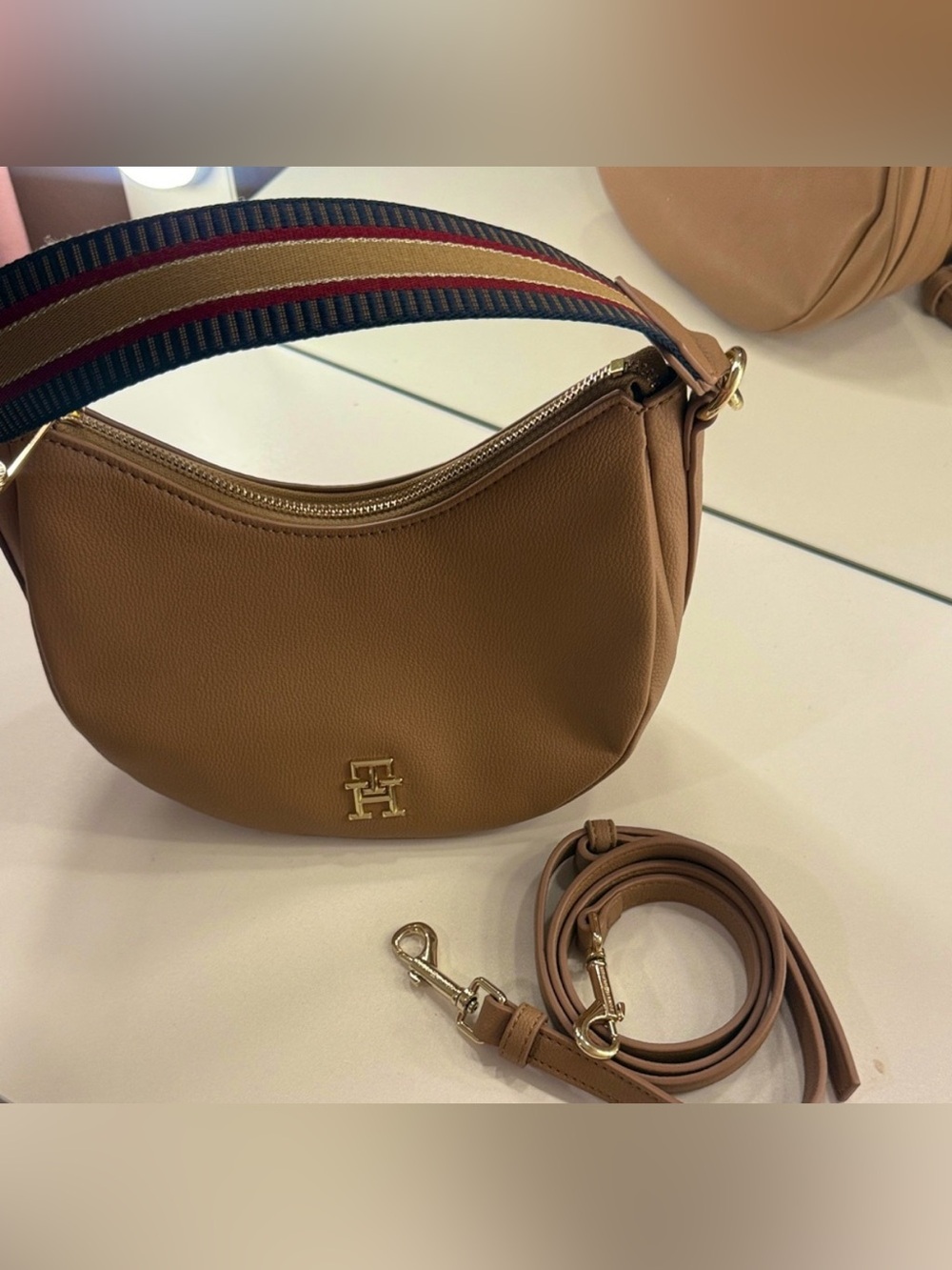 Tommy Hilfiger Tan Crossbody
Bag with Gold Logo